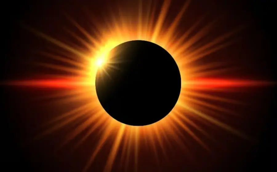 Imagen ilustrativa del eclipse solar anular, conocido como 'anillo de fuego', mostrando a la luna cubriendo el centro del sol.