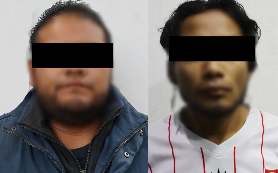 Los dos sujetos detenidos por policías de Oaxaca de Juárez.