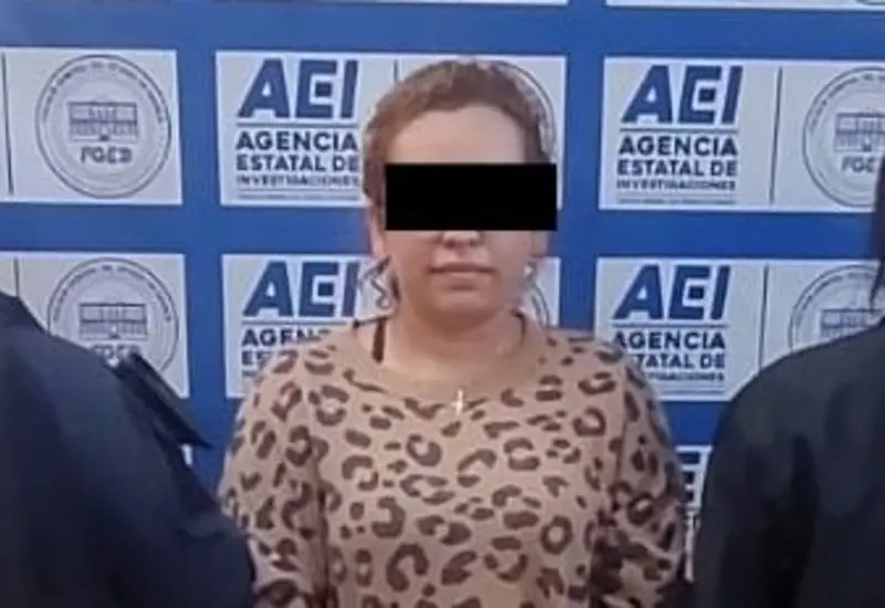 La mujer identificada como E.H.G., conocida como la 'viuda negra', tras ser detenida en Huajuapan de León por el asesinato de su esposo.