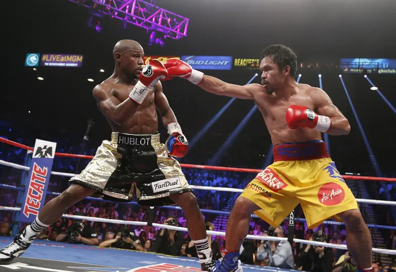 Los boxeadores Floyd Mayweather Jr. y Manny Pacquiao se preparan para su pelea de revancha, anunciada once años después de su primer enfrentamiento.